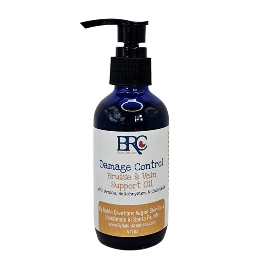 By Robin Creations Damage Control bruise and varicose vein support oil bottle, natural body care product with herbal ingredients.