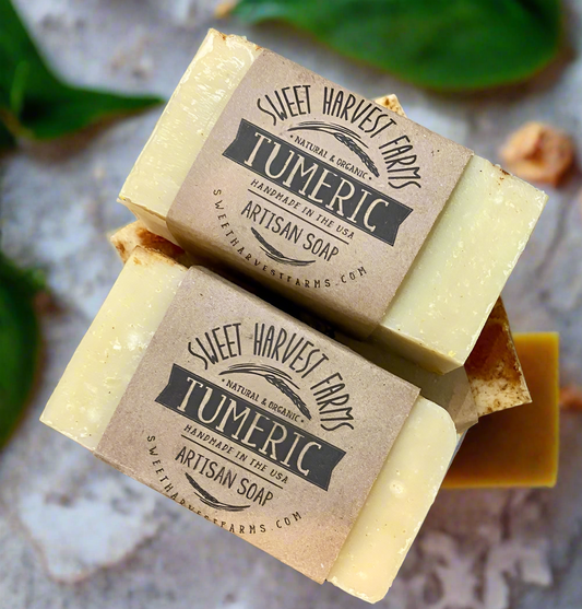 Organic handmade turmeric soap by Sweet Harvest Farms, showcasing a natural yellow soap bar with turmeric root and herbal accents.