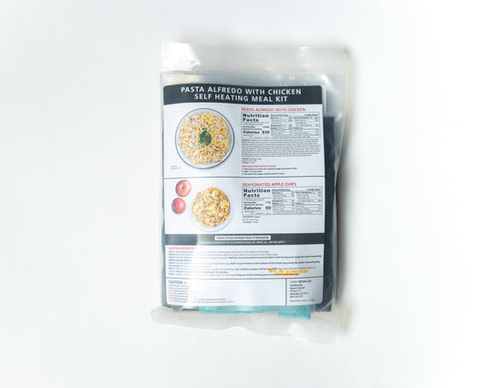 Heaven's Harvest self-heating meal kit featuring freeze-dried pasta Alfredo with chicken, shown on white background.