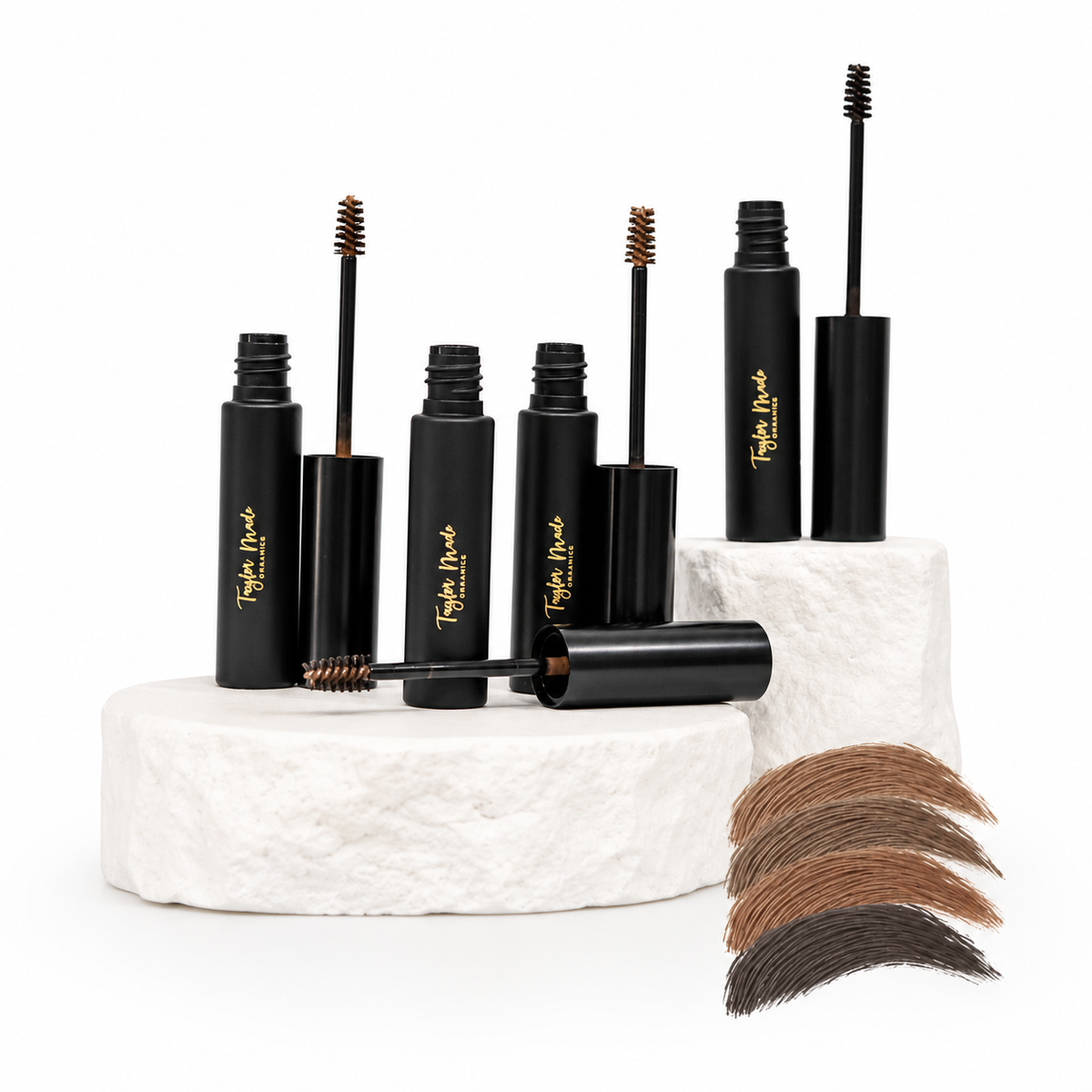 Taylor Made Organics brow gel for tinting and taming eyebrows, featuring a brush applicator and clear, natural finish.