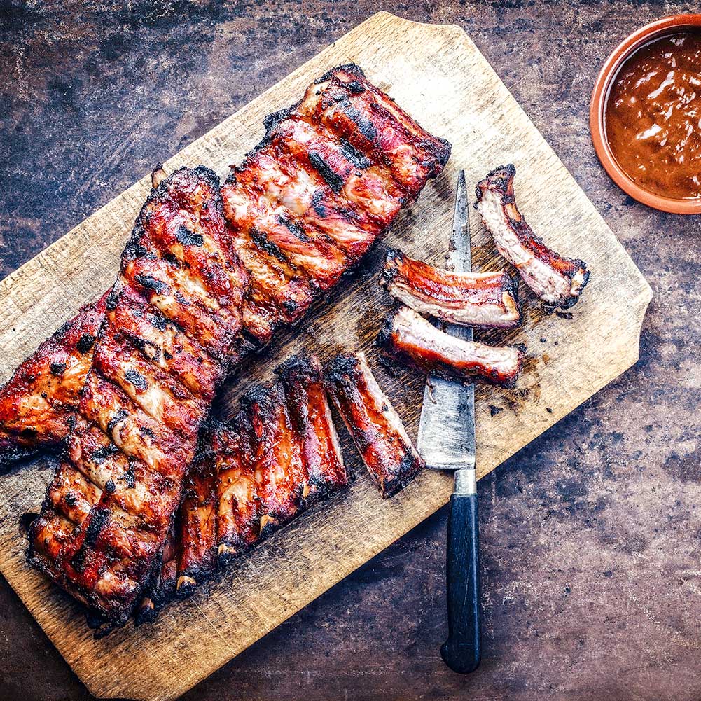Build-a-Rib BBQ package from Pig of the Month BBQ featuring handcrafted ribs ready for grilling or smoking.