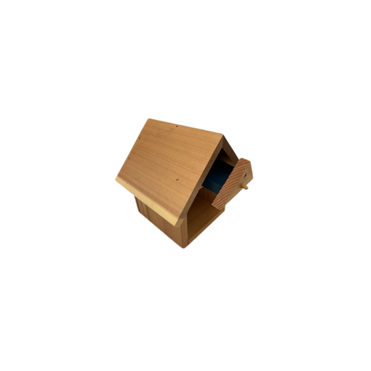 Cedar bee house with hatchery from CrownBees designed for native bees, featuring multiple nesting compartments and a roof.