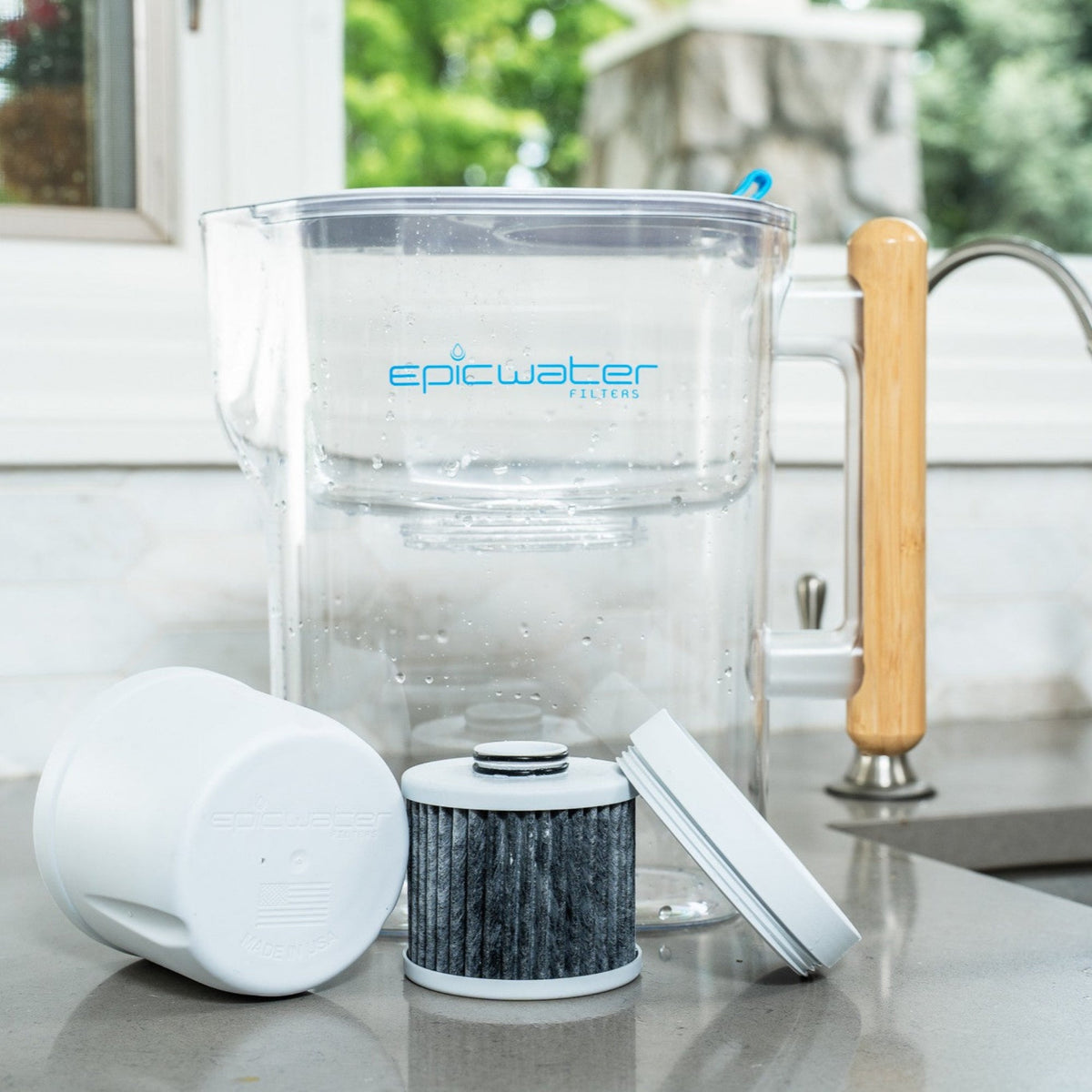 Epic Water Filters Pure XP pitcher in red, designed to reduce fluoride, PFAS, and parasites for cleaner drinking water.