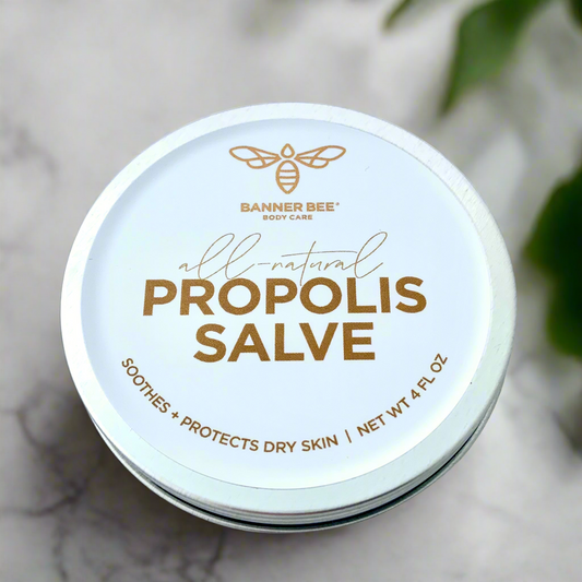 Bottle of BannerBee Propolis Salve for hands and body, natural body care product in a tube with a label and soothing ingredients.