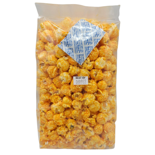 Bacon cheddar popcorn in a 3.5 oz bag from HR Poppin' Snacks, showing crispy popcorn coated with cheese and bacon flavor.