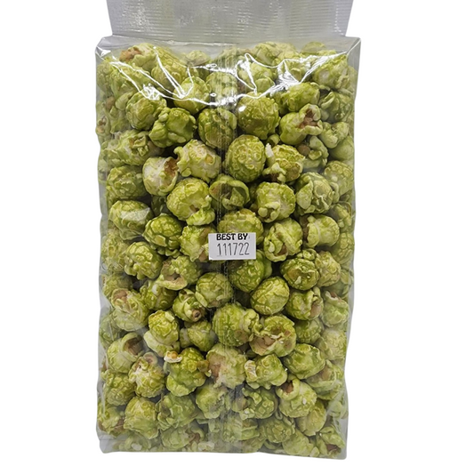 Bright green apple-flavored popcorn in a 7 oz bag from HR Poppin' Snacks, featuring fresh green apple pieces and crunchy popcorn.