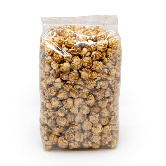 Sweet caramel popcorn in an 8 oz bag from HR Poppin' Snacks, featuring golden, crunchy popcorn coated with rich caramel.