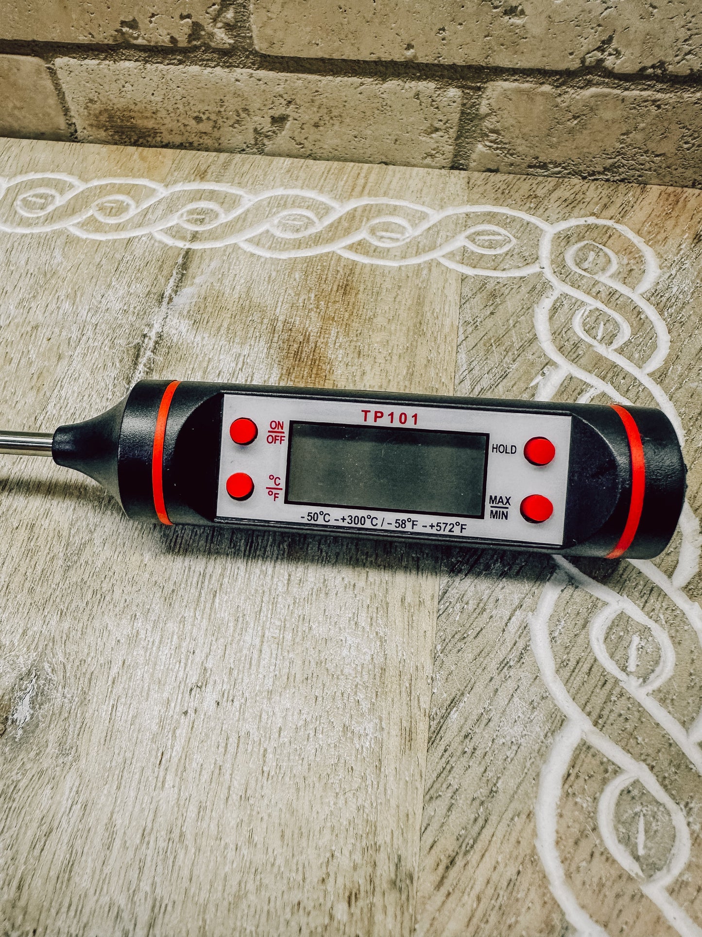 Onic Brands bread thermometer with digital display, stainless steel probe for precise baking temperature measurement.