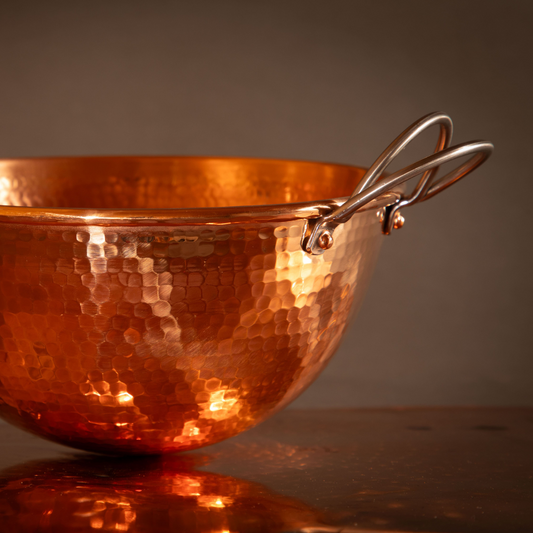 Set of three Sertodo copper mixing bowls in various sizes, showcasing their shiny, durable finish for culinary use.