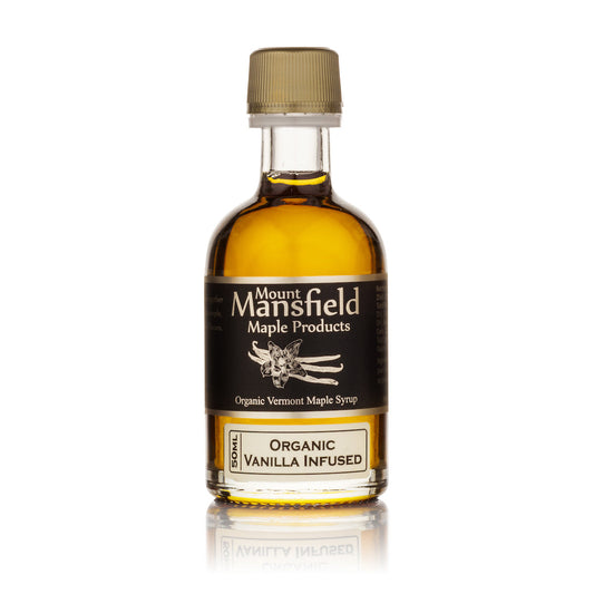 Vanilla bean infused Vermont maple syrup in a 50ml glass bottle by Mount Mansfield Maple Products.