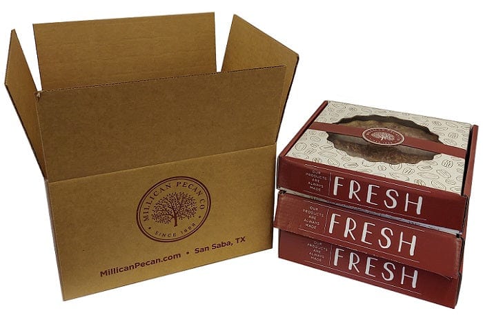 Three slices of Millican Pecan Texas Southern Pecan Pie in a case, showcasing the rich pecan filling and flaky crust.