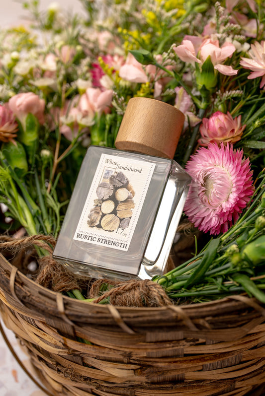 Rustic Strength White Sandalwood perfume bottle, 1.7oz, with elegant packaging and a sleek design.