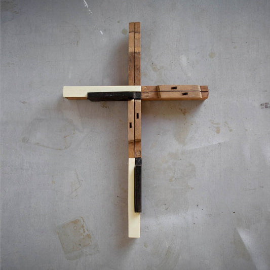 Wooden piano key cross by Dennehey Design Co. featuring realistic piano key details with a rustic, handcrafted appearance.