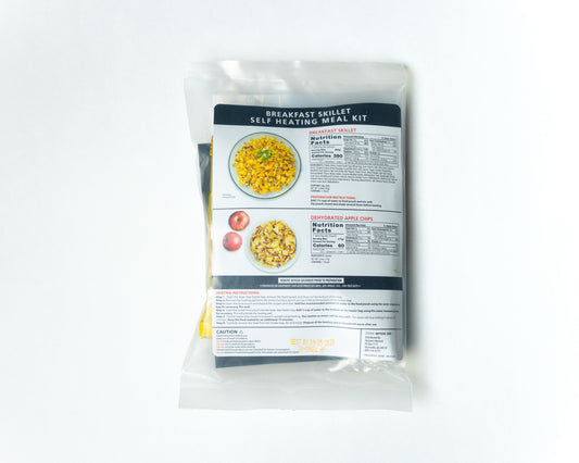 Self-heating sausage, egg, and potato breakfast skillet from Heaven's Harvest freeze-dried meal kit on white background.