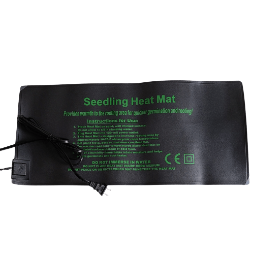 Hasty Roots seedling heat mat for gardening, showing a close-up of the black heating pad with seedlings growing on top.