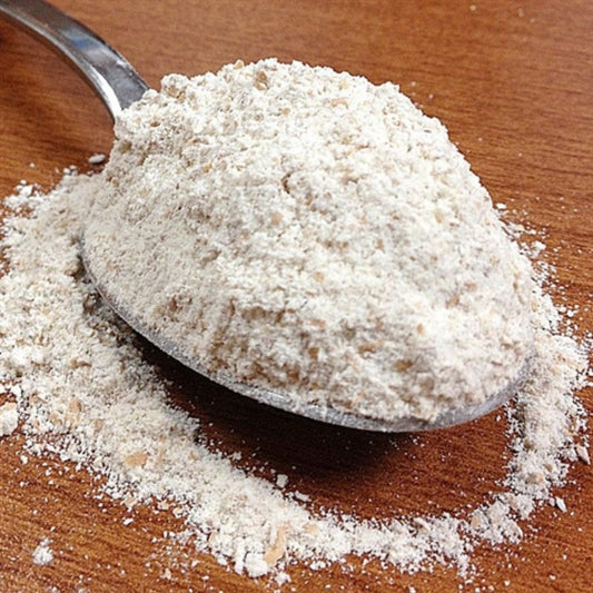 Organic spelt flour in a 1.5 lb bag from Grain Place Foods, non-GMO whole grain product for baking and cooking.