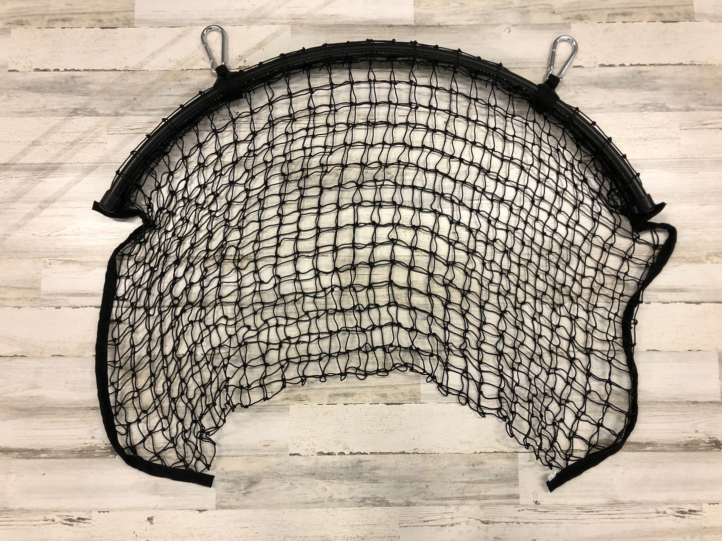 Square bale net from Haylo Haynets, LLC, showing a tightly woven net designed for securing square hay bales.