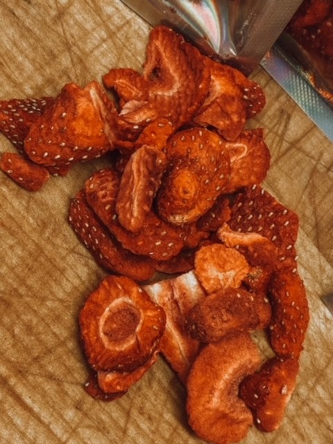 Dehydrated strawberries from Onic Brands LLC, suitable for soups and food, shown as vibrant, dried strawberry slices in the image.