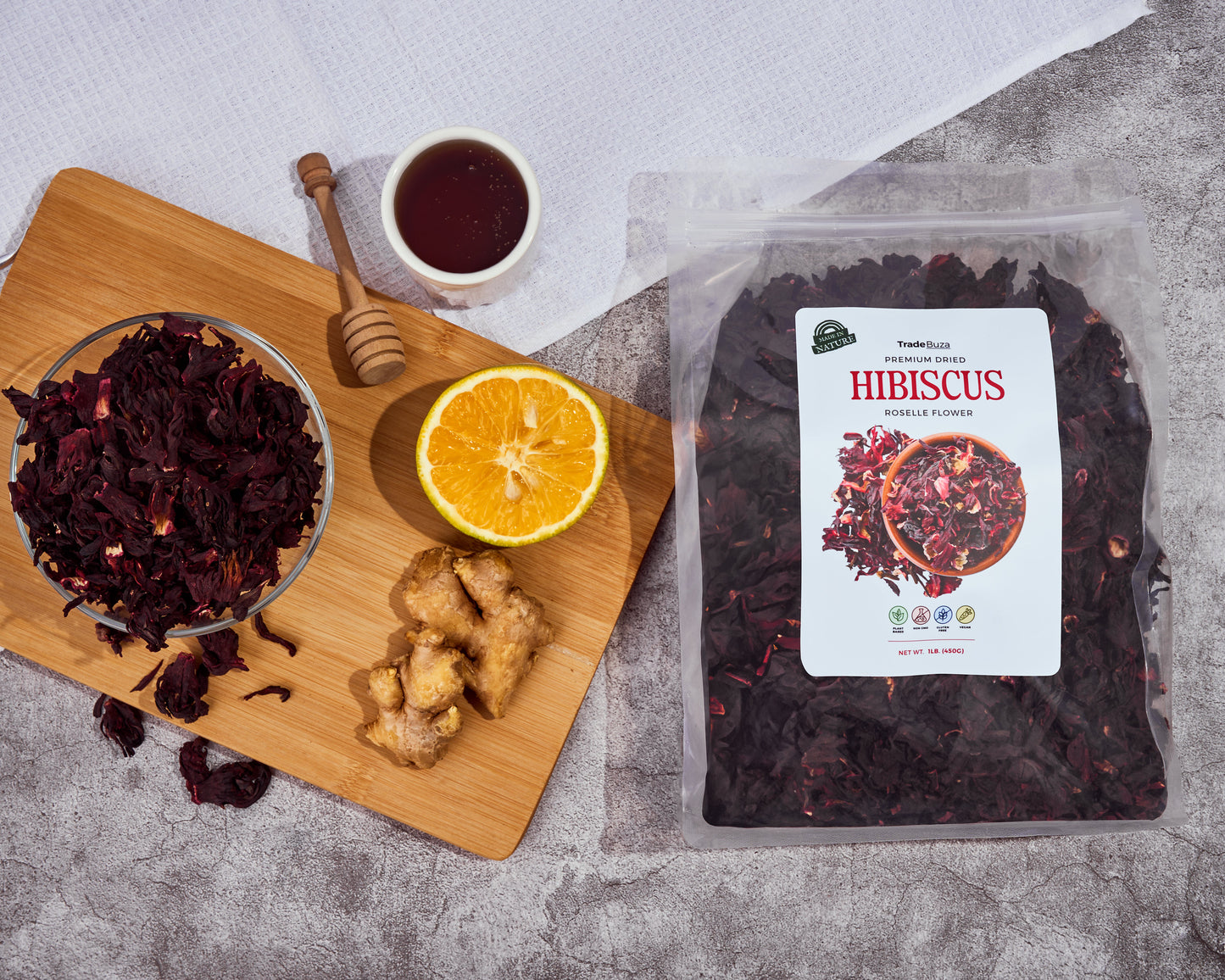 Dried hibiscus flowers in a resealable bag, whole sun-dried petals for tea, agua fresca, and cocktails, by TradeBuza.