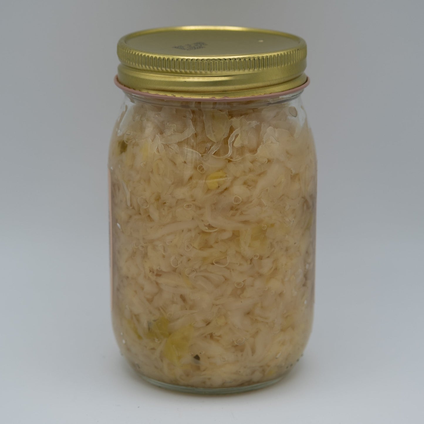 Canned Amish Country Store Old Fashioned Sauerkraut in a 32oz jar, showcasing the fermented sauerkraut with a rustic label.