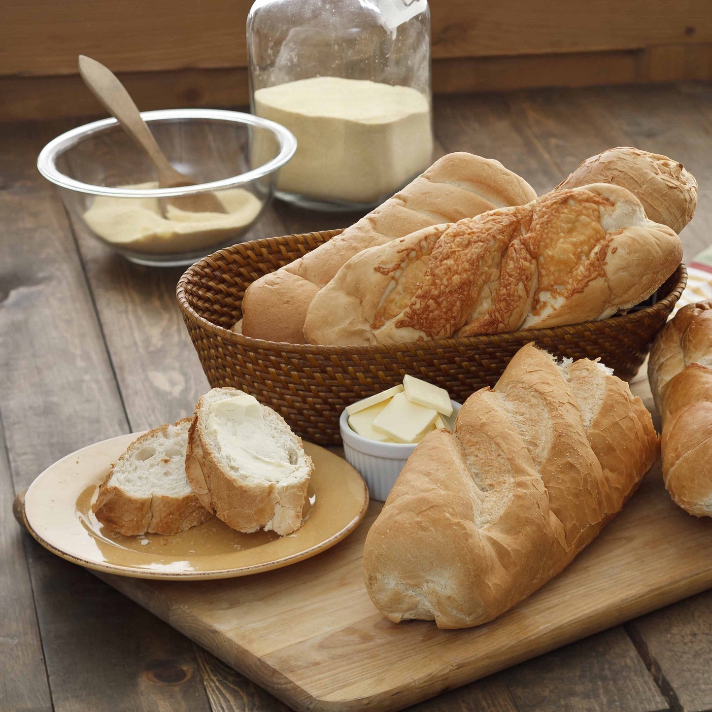 Augason Farms bread and roll mix can with 48 servings, featuring baking ingredients and a sealed storage container.