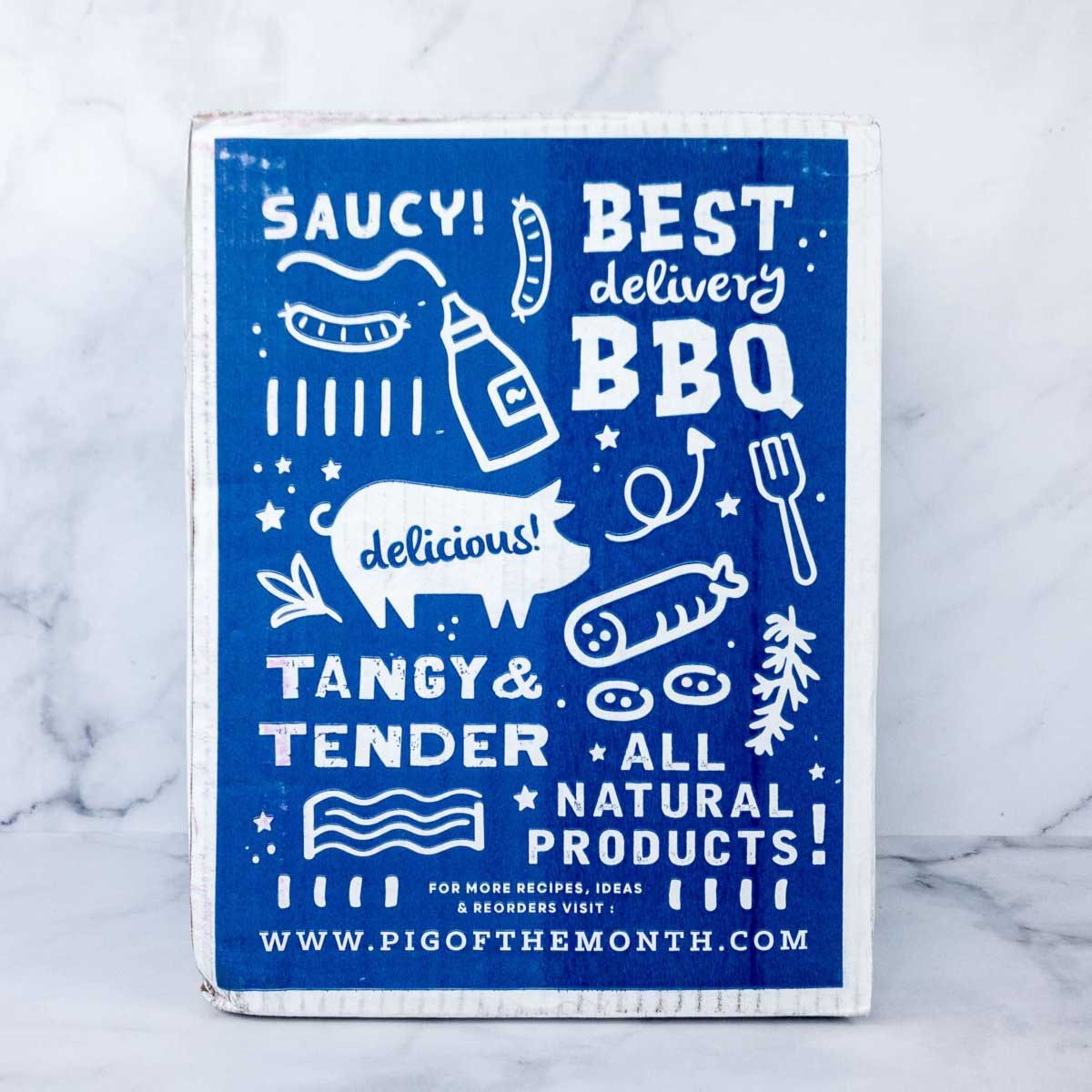 Pig of the Month BBQ Bacon of the Month Club box with 2 lbs of small-batch bacon for monthly BBQ enjoyment.