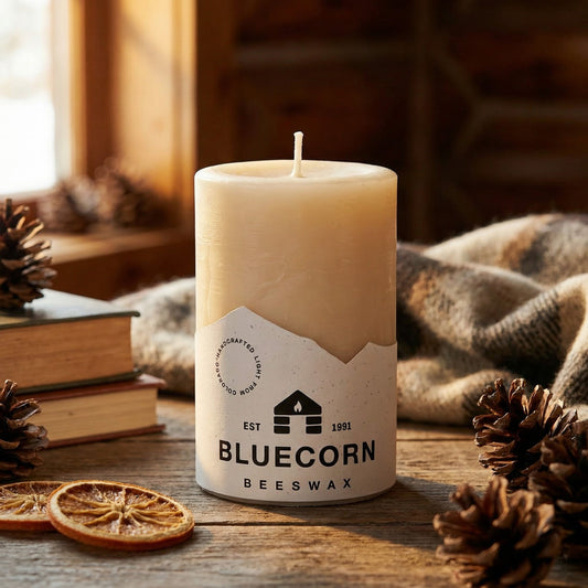 Handmade ivory beeswax pillar candles by Bluecorn Candles, long-burning, non-toxic, perfect for fall decor and Christmas gifts.