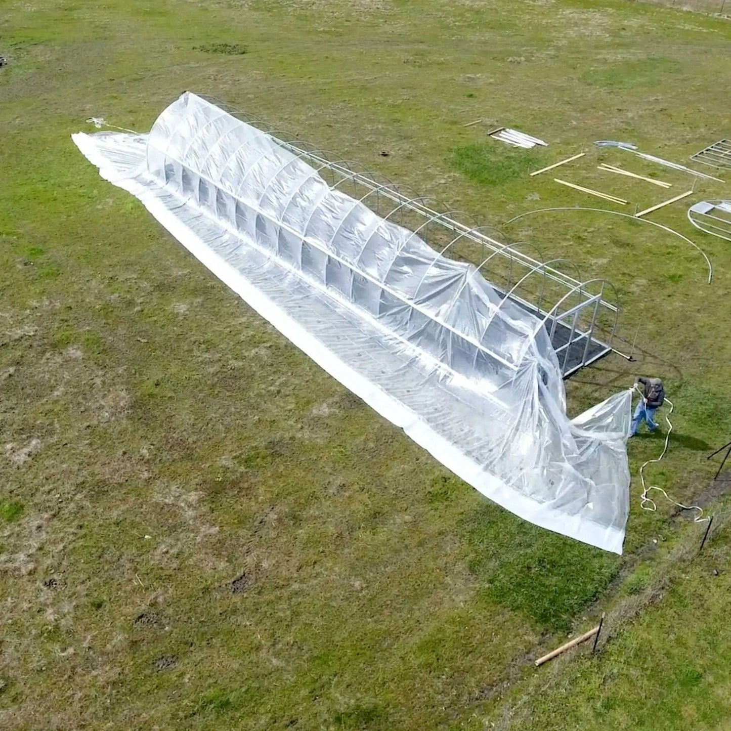 Clear 6 mil greenhouse plastic by Bootstrap Farmer, designed for durable, transparent cover for greenhouse structures.