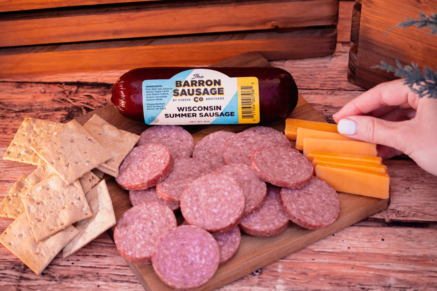 Slices of Barron Sausage Co. Summer Sausage from Cheese Brothers, Inc., showcasing the cured meat's texture and rich flavor.