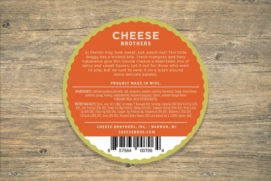 Creamy Mango Habanero Gouda cheese from Cheese Brothers, Inc., showcasing the smooth cheese with vibrant mango and spicy habanero bits.