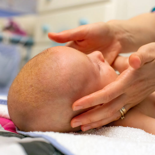 Oh Baby Oh Heads Up organic cradle cap treatment by Sweet Harvest Farms, showing the product bottle with natural ingredients label.