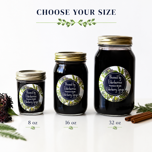 Bottle of Blessed by Elderberries elderberry syrup with fresh elderberries and herbs in a glass jar on a wooden surface.