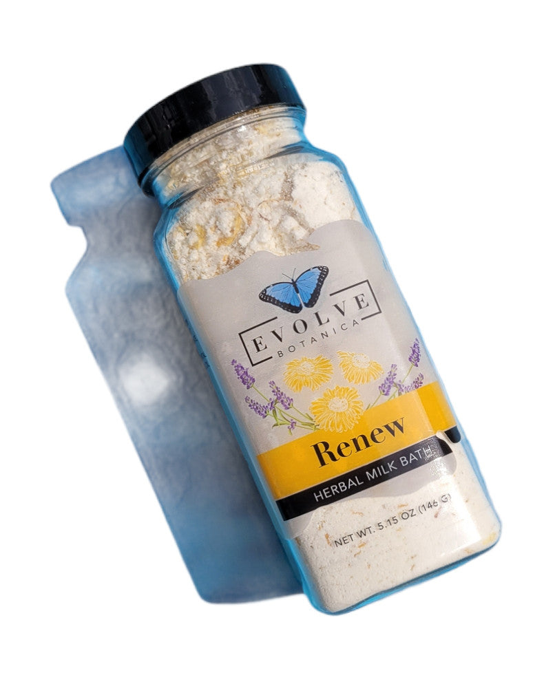 Herbal Milk Bath by Evolve Botanica featuring natural herbs and soothing ingredients in a glass jar.