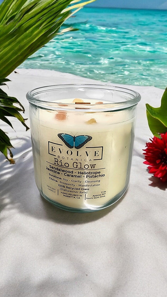 Evolve Botanica Rocks Candle Rio Glow with wood wick, sunstone and citrine gemstones, soy wax, decorative candle on a neutral background