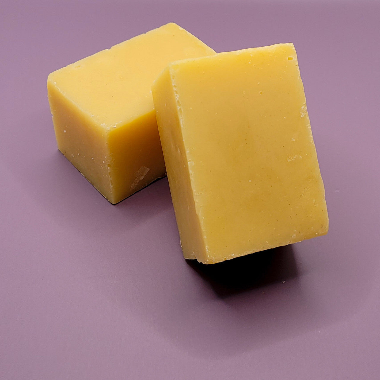 Evolve Botanica Lemon Lavender Silk specialty soap wrapped in unprinted glassine bag, showcasing a smooth, fragrant soap bar.