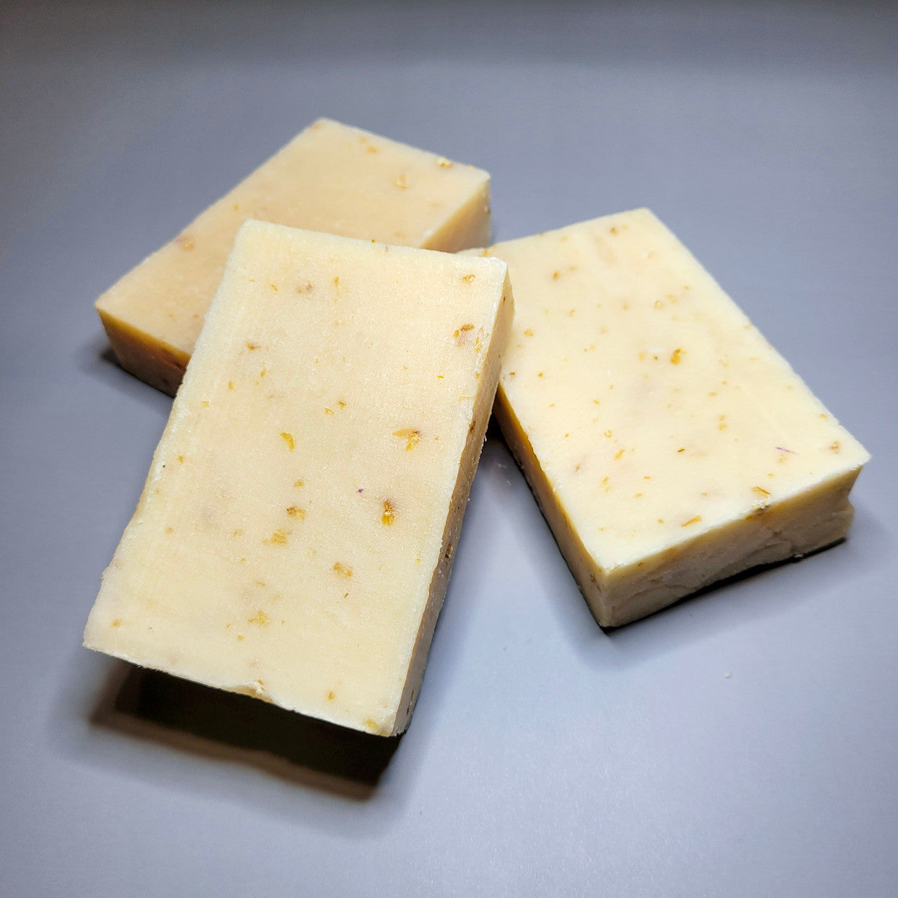 Evolve Botanica oatmeal, milk, and honey goatmilk facial and body soap in unprinted glassine bag, natural and nourishing.