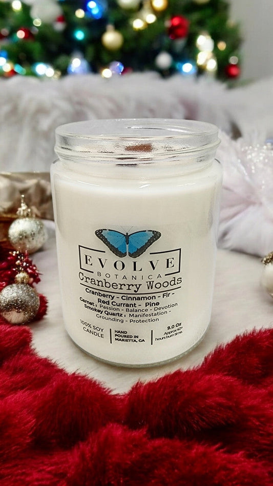 Evolve Botanica 9oz Jam Jar Crystal Soy Candle with cranberry woods scent, garnet and smokey quartz accents, natural wood wick