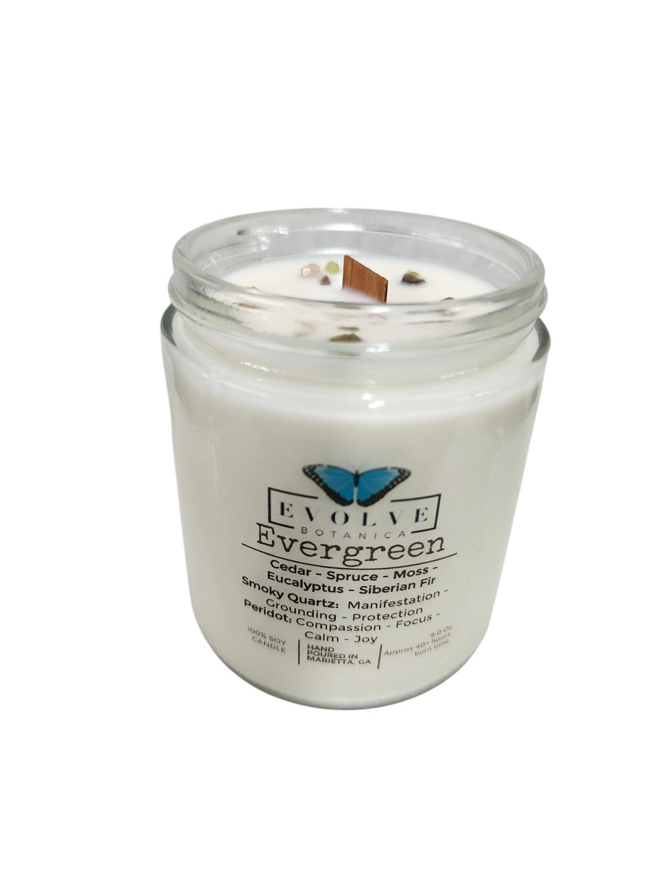 Evolve Botanica Classic 9oz jam jar soy candle with evergreen scent, smoky quartz, and peridot crystals, natural wood wick.