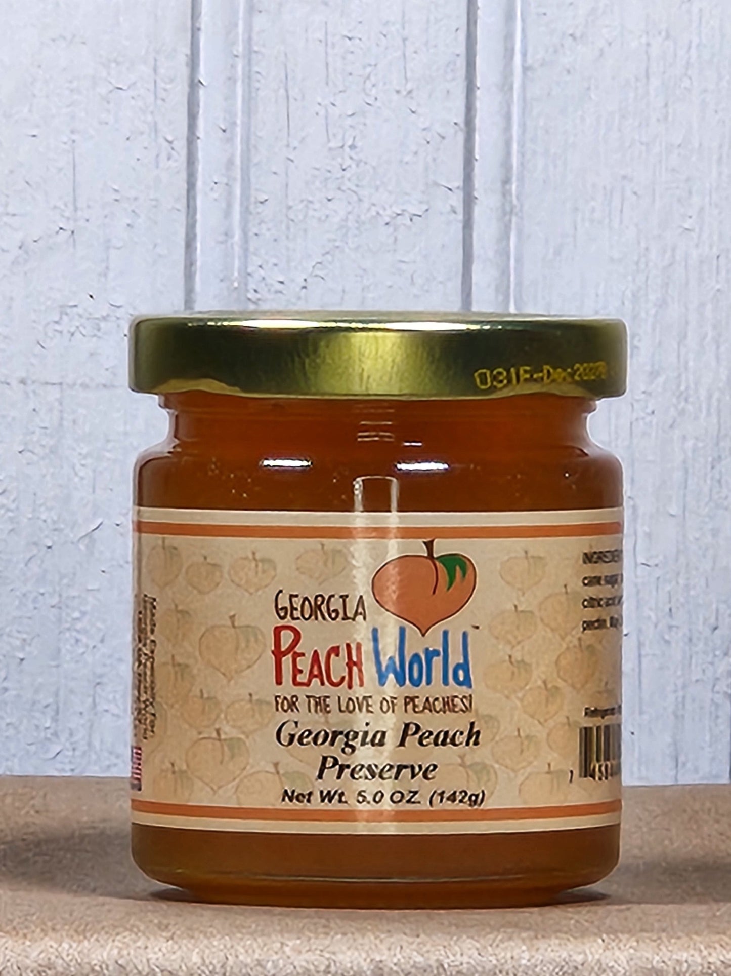 Georgia Peach World Georgia Peach Preserves 5 oz jar, sweet peach spread in a clear glass jar with a vibrant label.