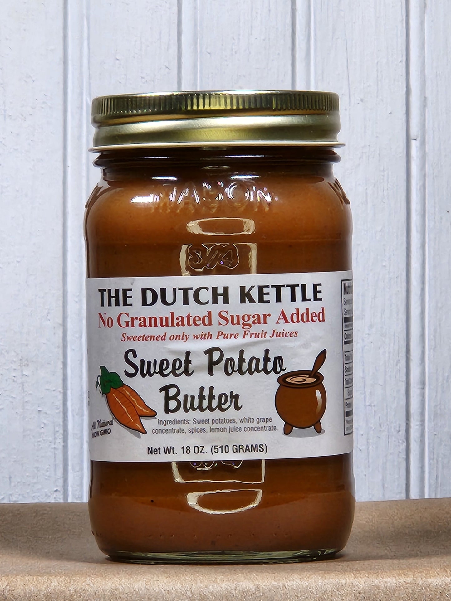 Creamy sweet potato butter from Georgia Peach World, no sugar added, spread in a jar with a smooth, natural texture.