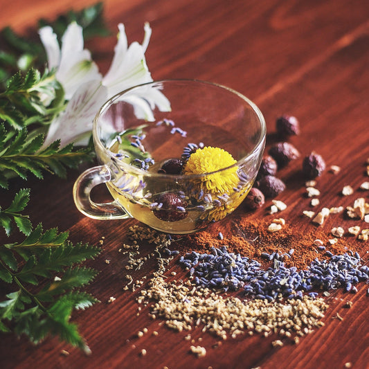 MIgardener herbal tea kit with fresh herbs and brewing supplies for growing your own herbal teas at home.