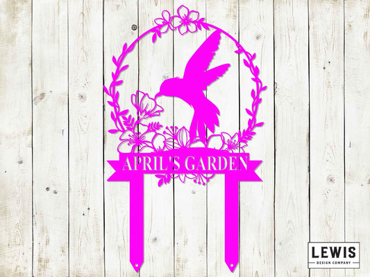 Black metal hummingbird garden stake by Lewis Design Company, outdoor patio and garden art for adding decorative charm.