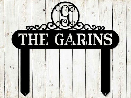 Black Monogram Scroll Yard and Garden Sign by Lewis Design Company, outdoor patio and garden art, 22x19 inches.