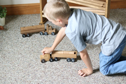 Wooden barrel truck toy with removable barrels in harvest stain finish, suitable for children, from AmishToyBox.com.