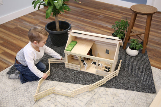 Large wooden A-frame barn toy with hay loft, realistic farm-themed wooden toy from AmishToyBox.com featuring detailed farm design.