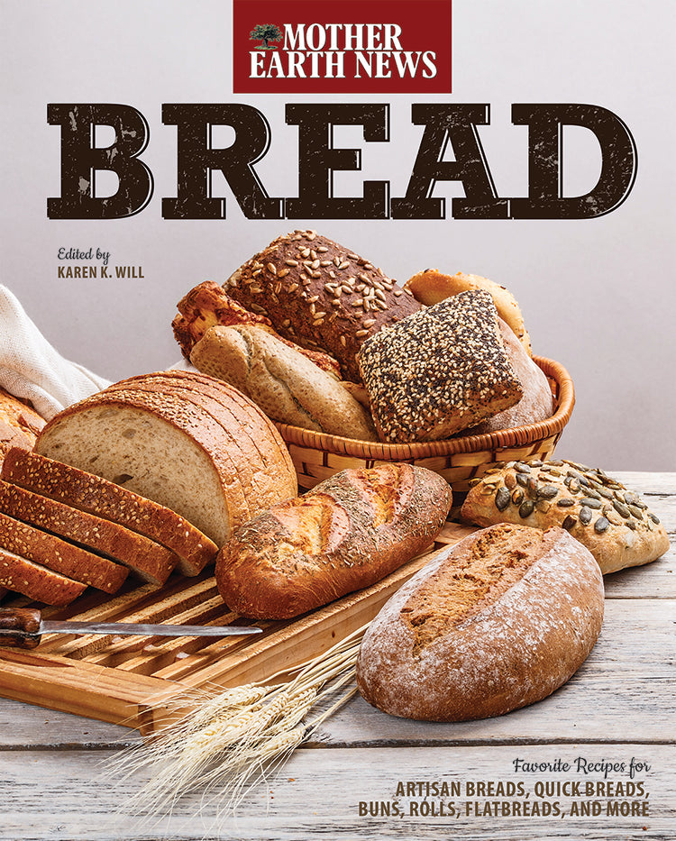 Mother Earth News book titled "Bread" featuring a close-up of the cover with bread imagery and text.