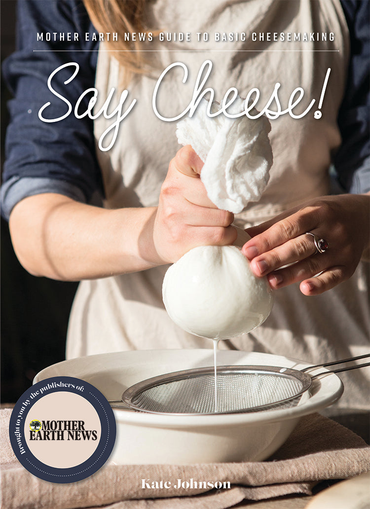 Mother Earth News "Say Cheese!" book cover featuring a cheese-making guide with illustrations and a rustic kitchen background.