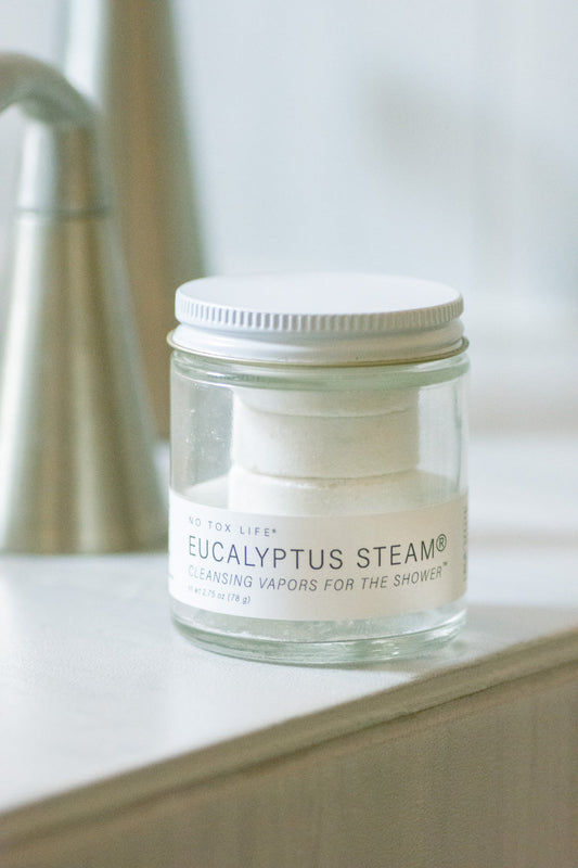 Mini jar of NO TOX LIFE Eucalyptus Steam® cleansing vapors for the shower, showing the product container and label.