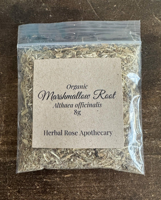 Organic marshmallow root in an 8g package from herbalroseapothecary, showing dried root pieces in a clear container.