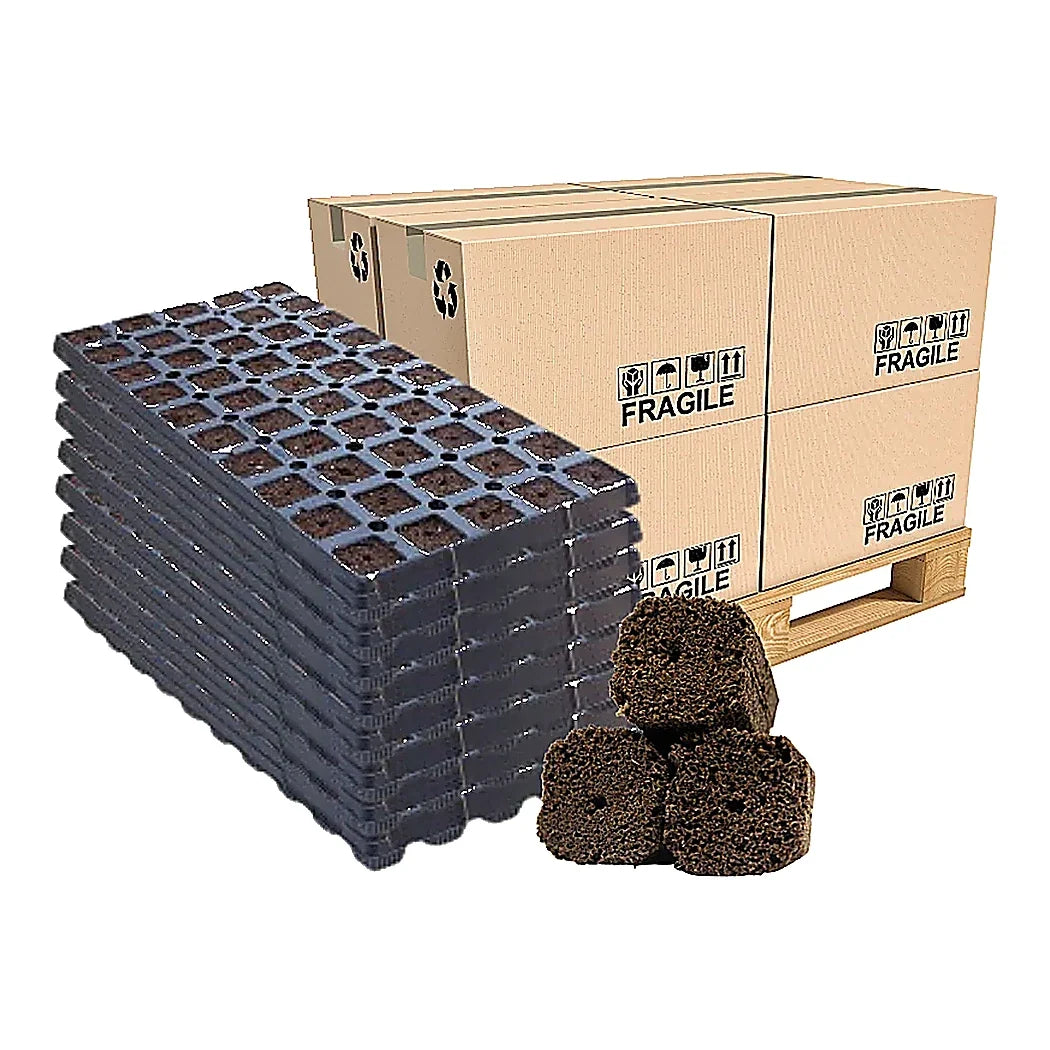 Pre-filled tray of 50 OrganiPlug seed and cutting plugs for planting, shown in a pallet setup by GrowersHouse.